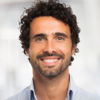Man smiling and happy with his dental implants