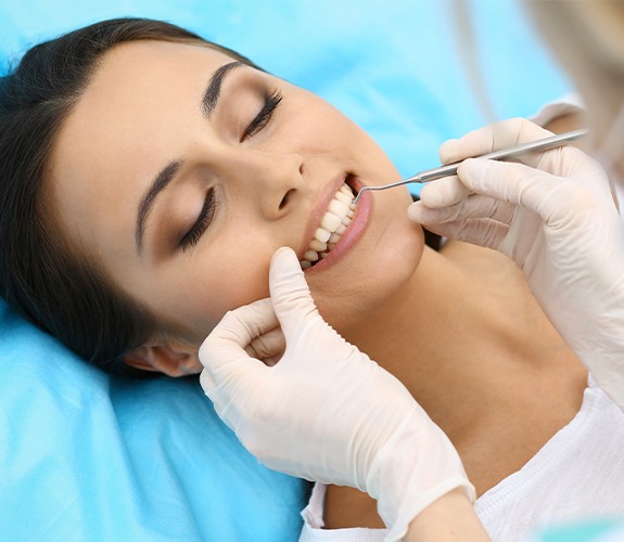 Woman receiving gum recontouring treatment