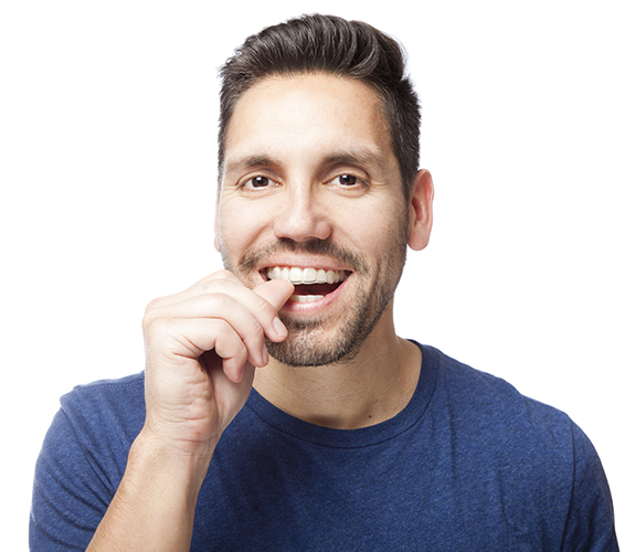 Man placing Invisalign tray