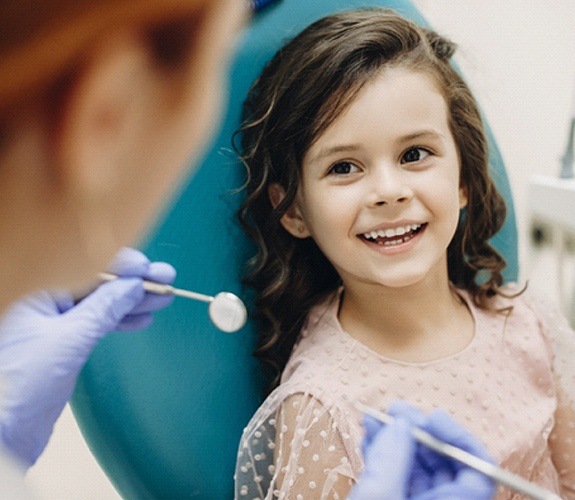 Illustration of pulp therapy being performed on the tooth