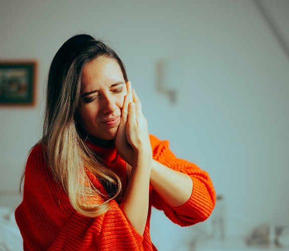 Woman experiencing tooth pain