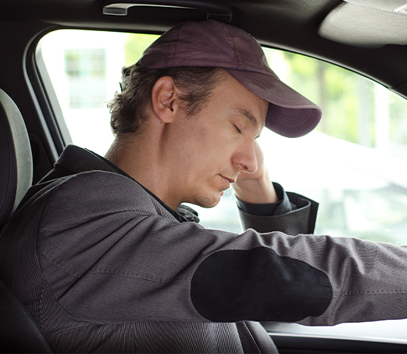 Man in need of sleep apnea therapy falling asleep while driving